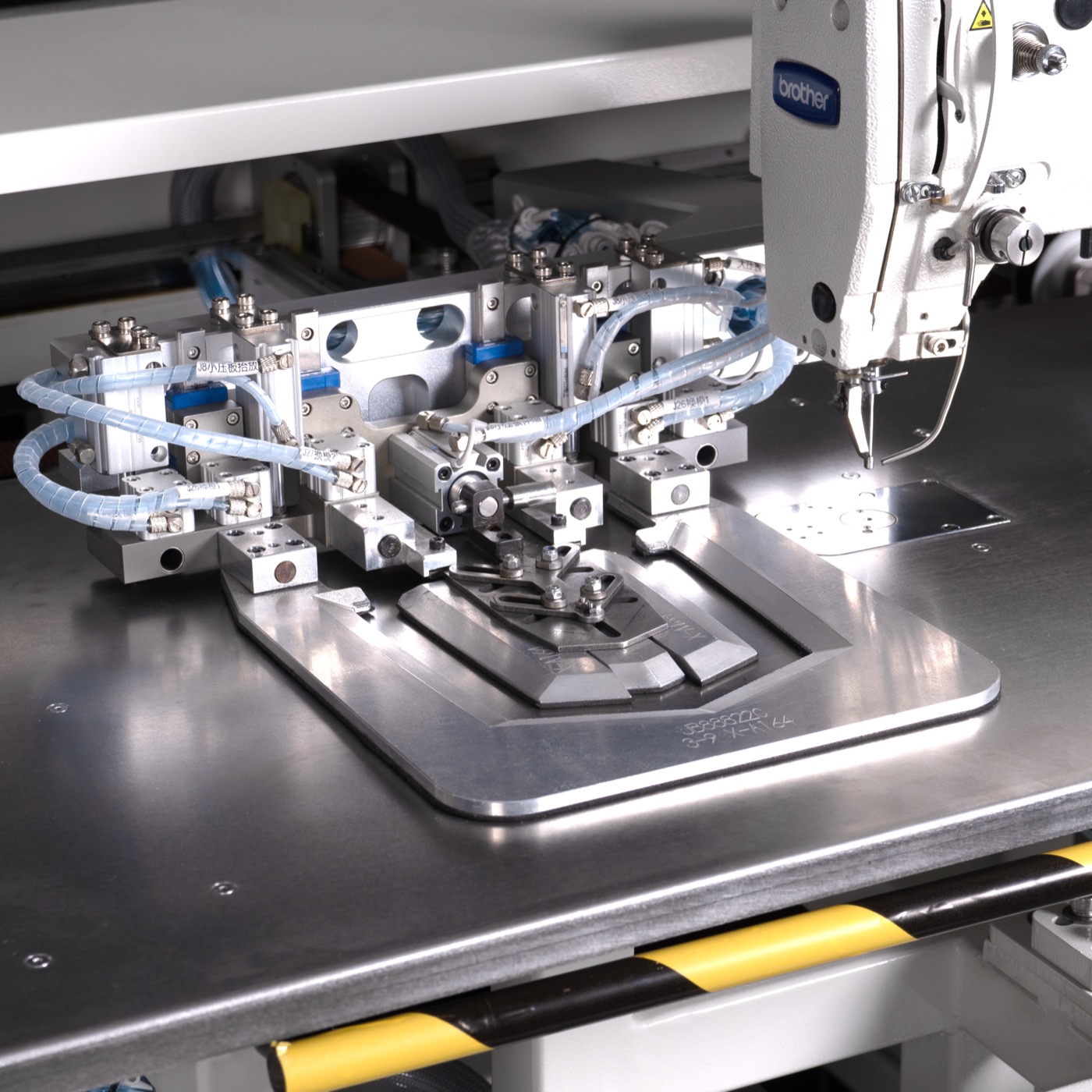 Automatic pocket setter jig and clamp detail